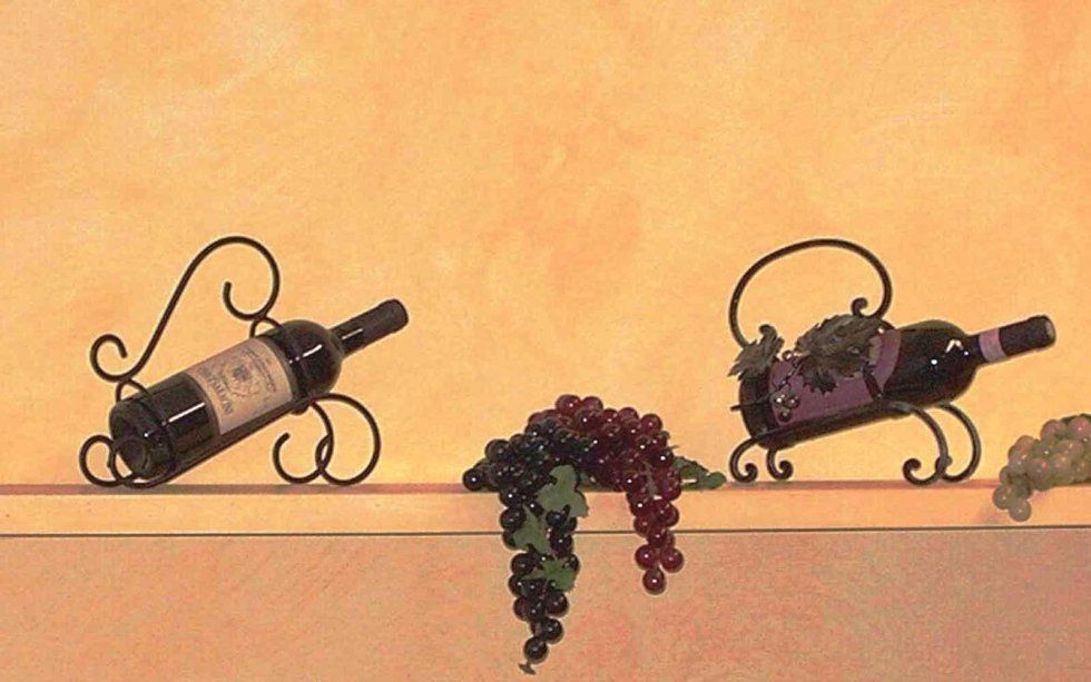 portabottiglie in ferro battuto