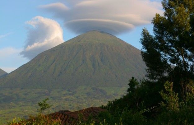 Mountain Muhabura with clouds on top