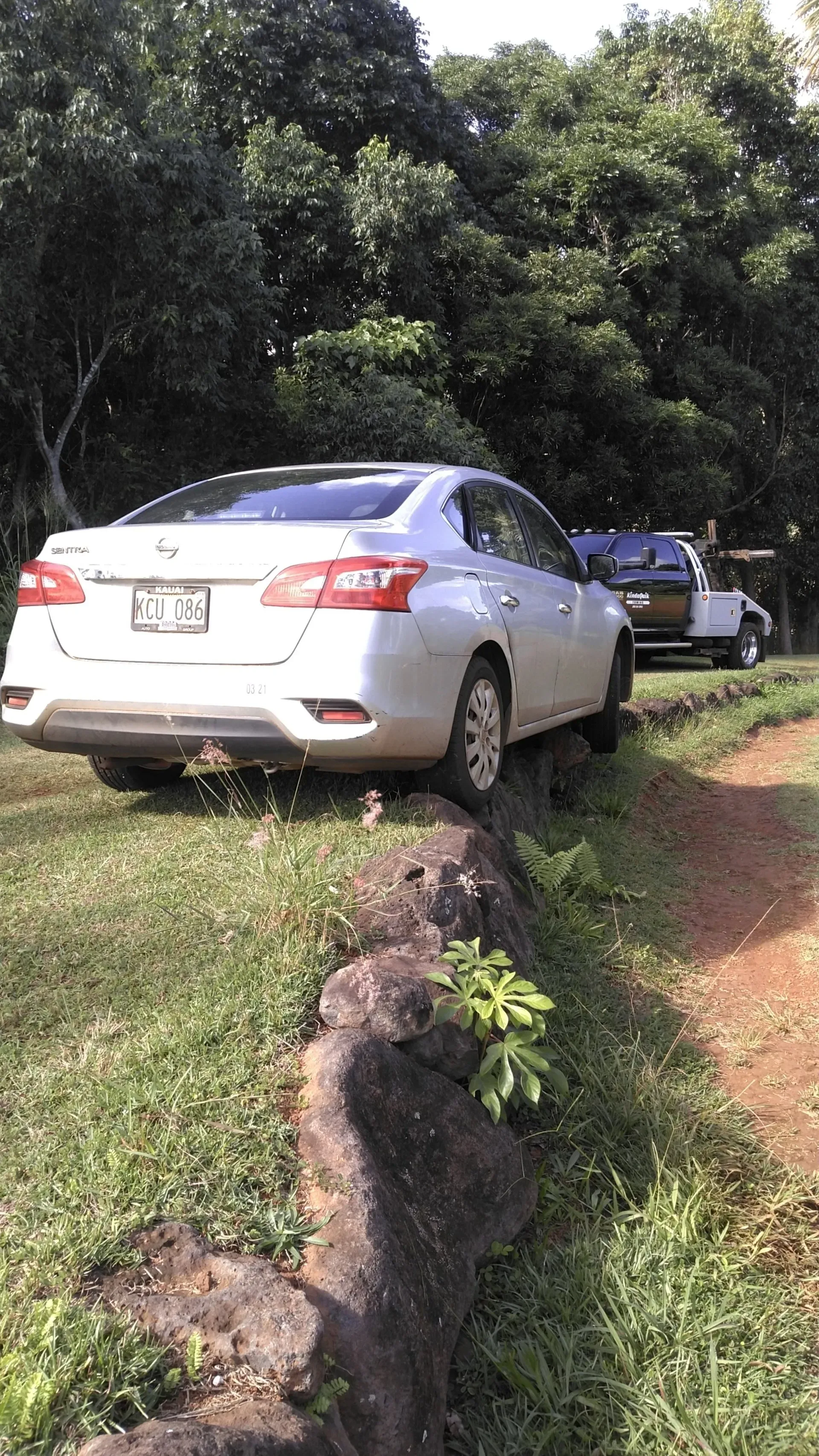 White Car Stuck — Lihue, HI — KindaQuik Towing