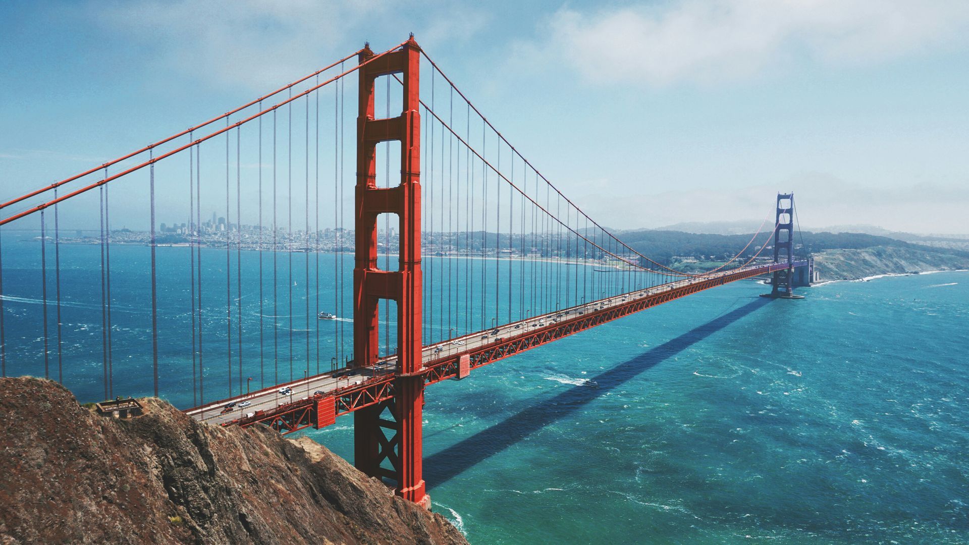 The golden gate bridge is a suspension bridge over the ocean in san francisco.