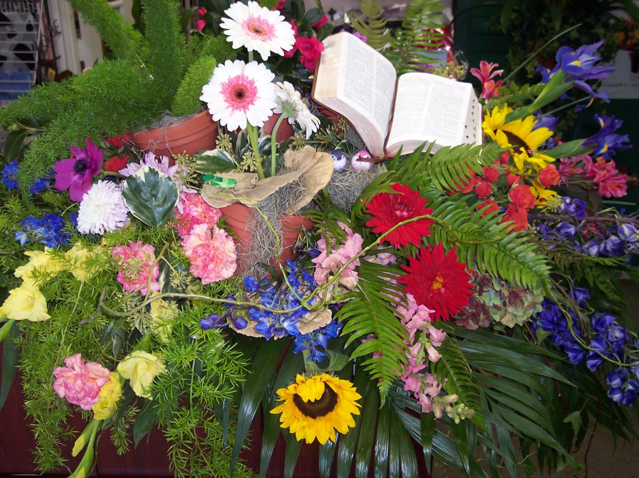 Casket Flowers — Funeral Flowers Draped Over a Casket in Houston, TX