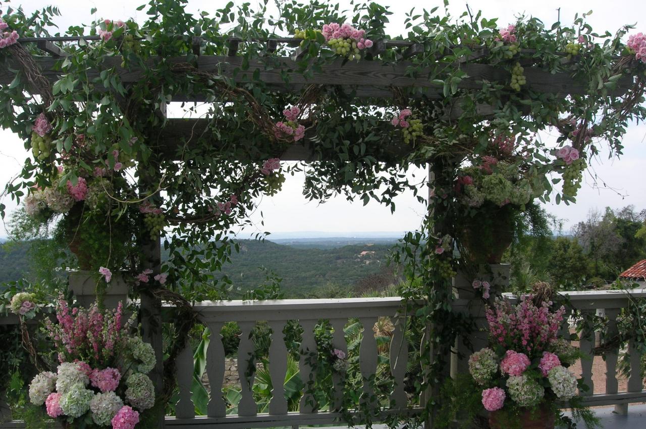 Wedding Flowers — Flowers and Vines Over a Wedding Arch in Houston, TX