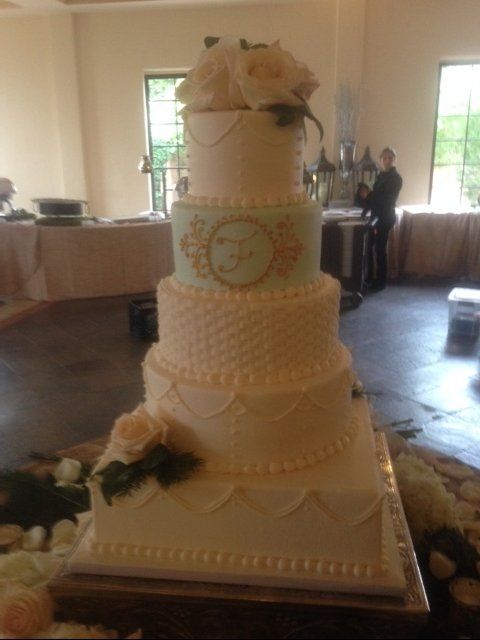 Cake Toppers — Fresh Flowers on a White Frosted Cake in Houston, TX