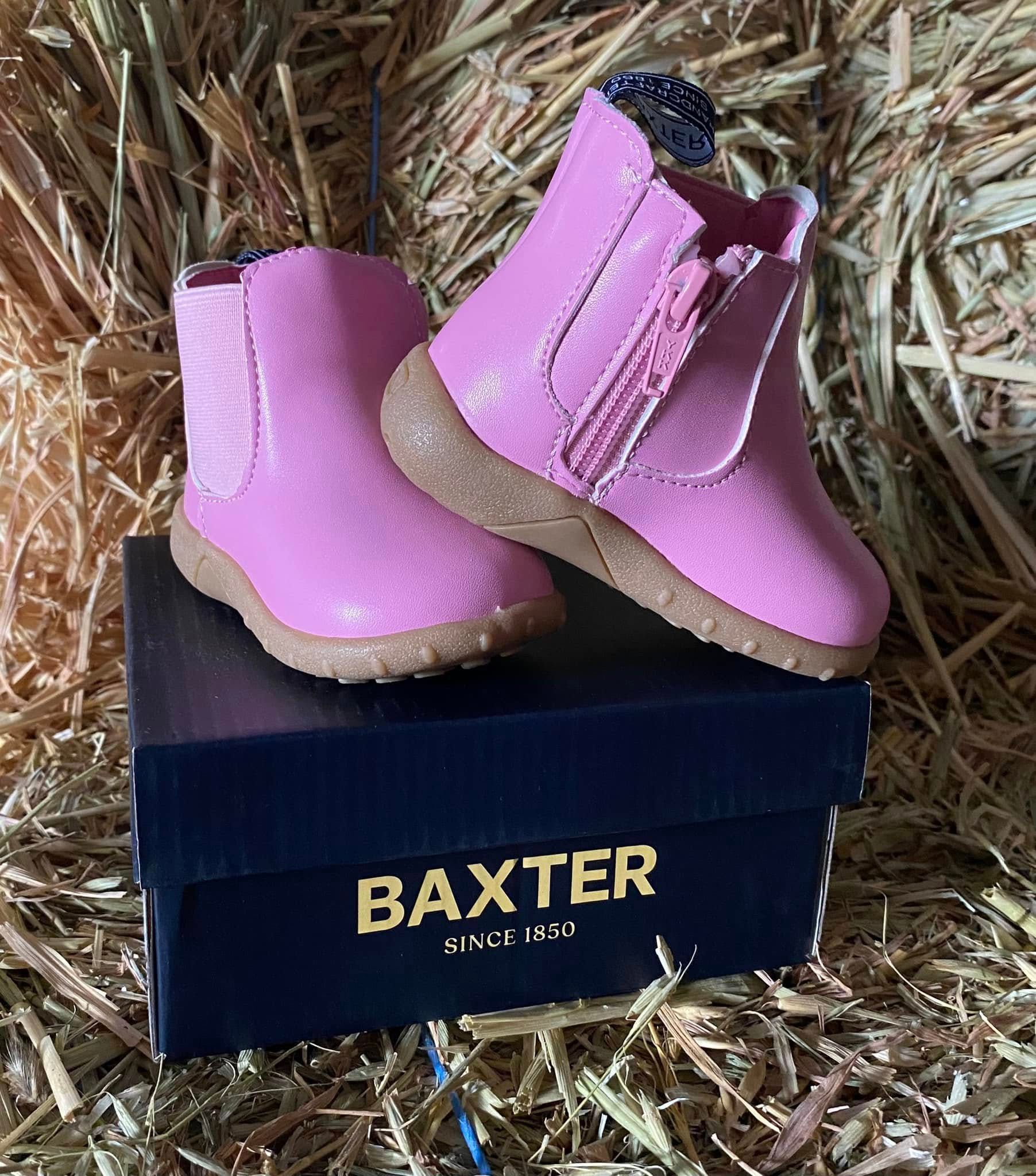 Pair Of Pink Baxter Boots Sitting On Top Of A Box — Wauchope Rural Centre In Wauchope, NSW