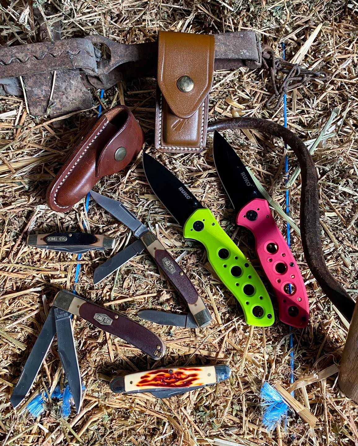 Pocket Knives And Pouches On Bale of Hay — Wauchope Rural Centre In Wauchope, NSW