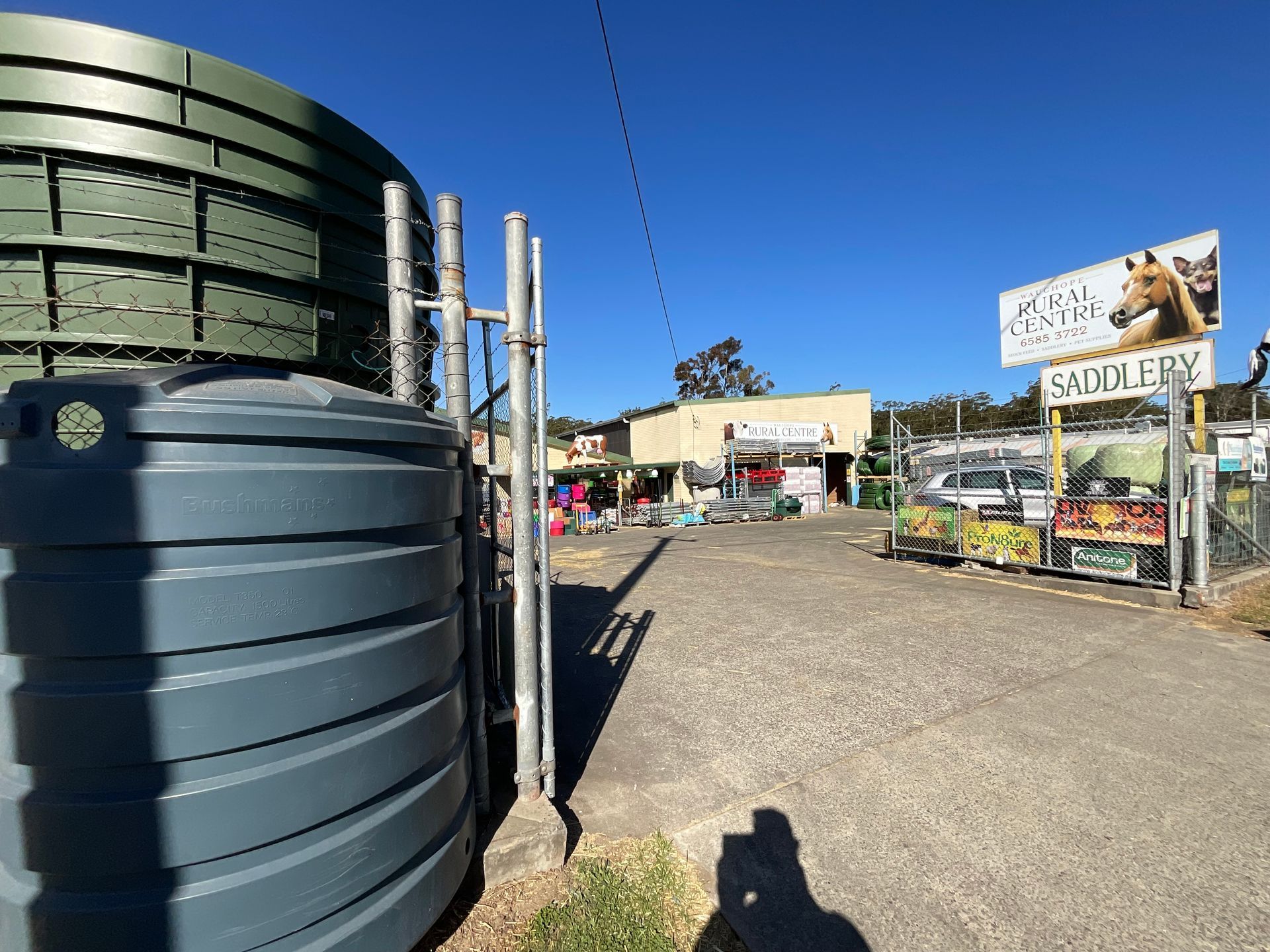 A Person Is Holding A Pile Of Pellets In Their Hands — Wauchope Rural Centre In Wauchope, NSW