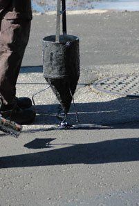 Top Repairs — Man Repairing Road Cracks in Denver, CO