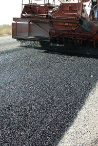 Double Chip Seal — Truck Dropping Asphalt On The Road in Denver, CO