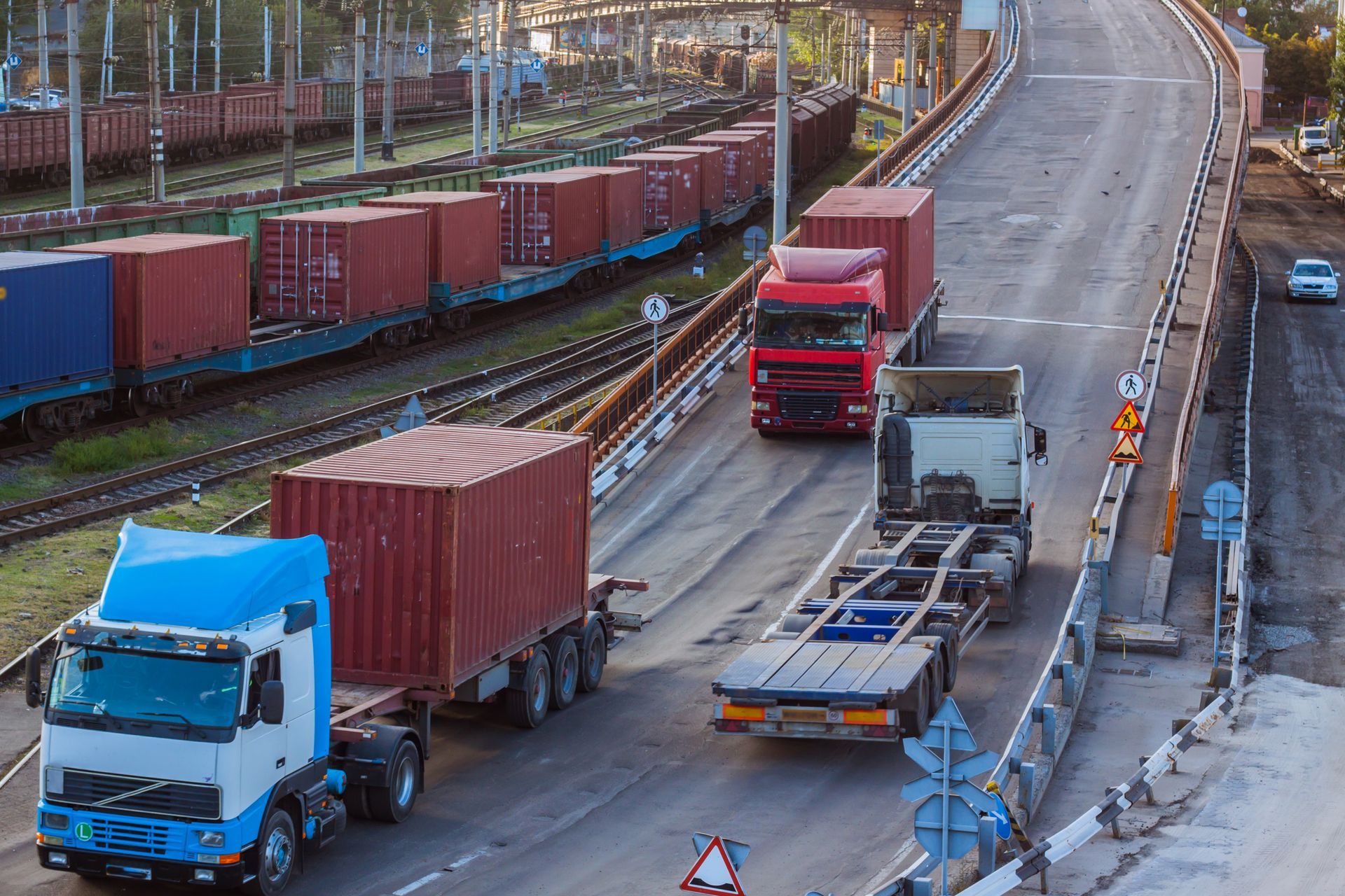 Trucks Carrying Cargo Containers on A Bridge — Kerubin Logistics Inc in the Philippines