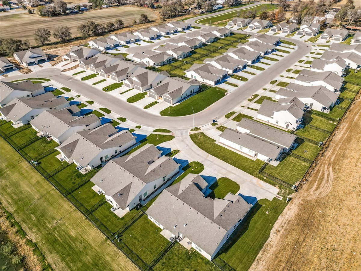 An aerial view of a residential neighborhood with lots of houses