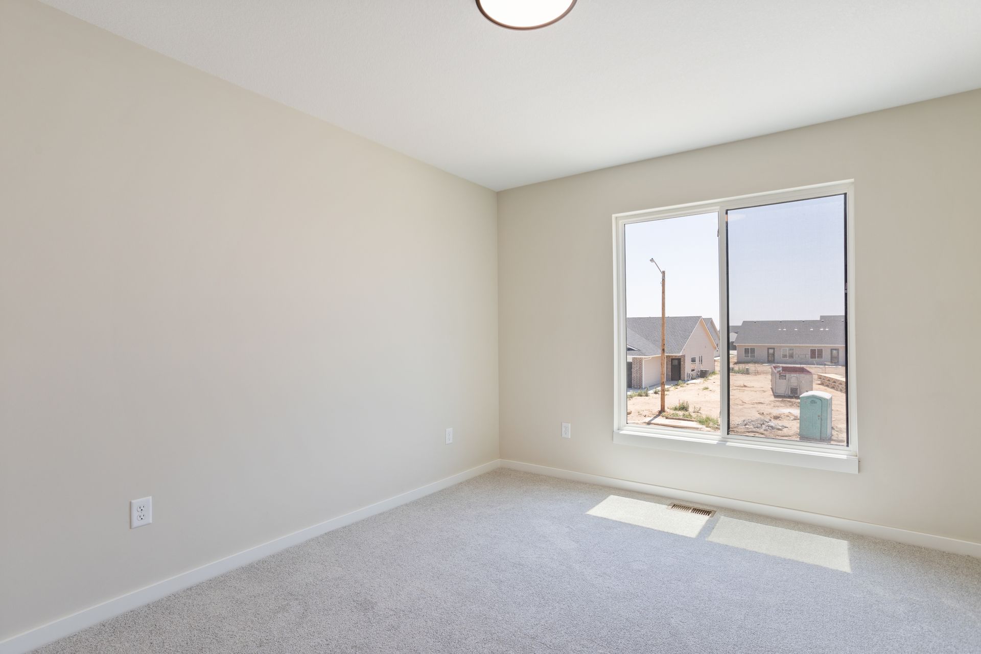 There is a large window in the middle of the room.