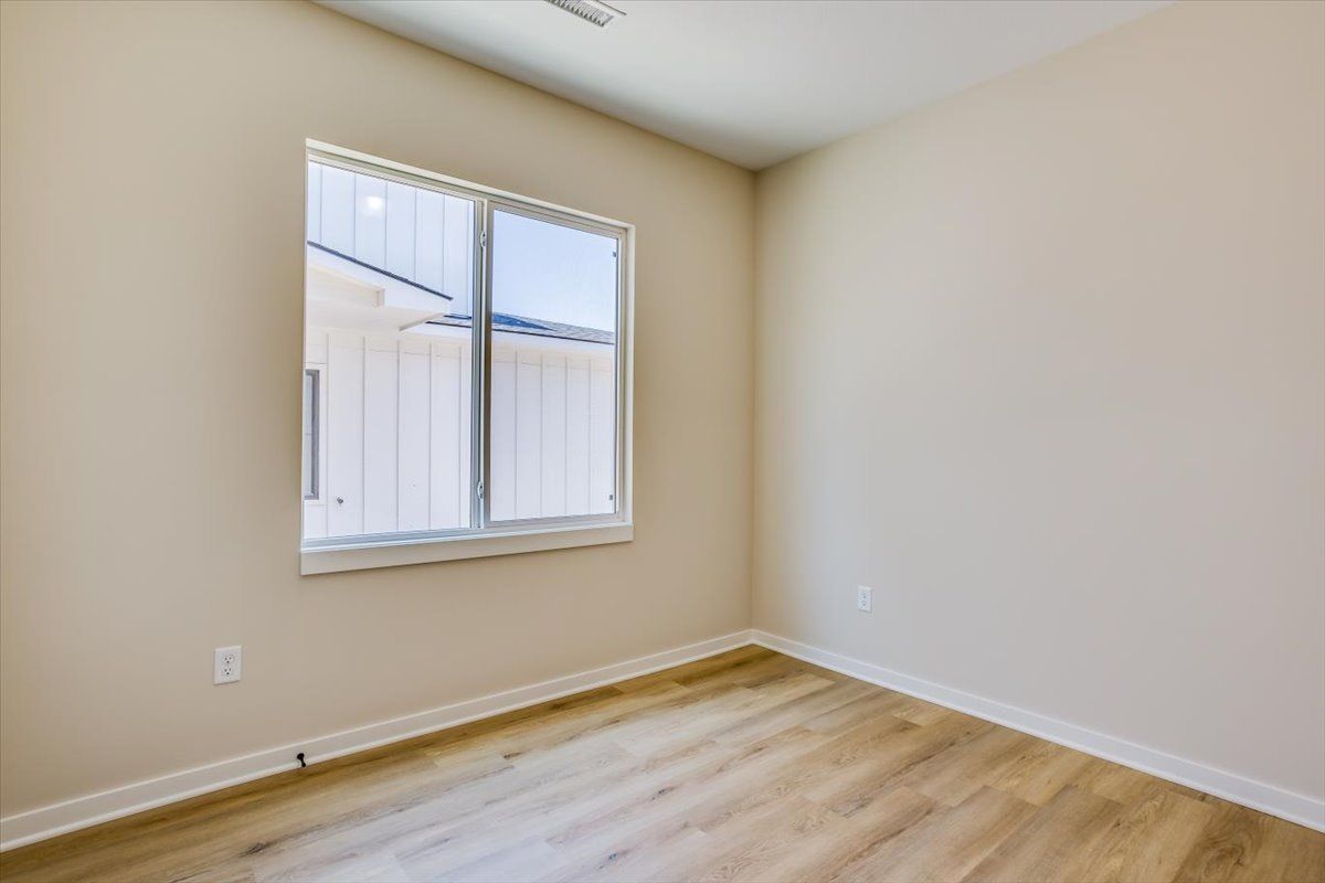 There is a large window in the middle of the room.