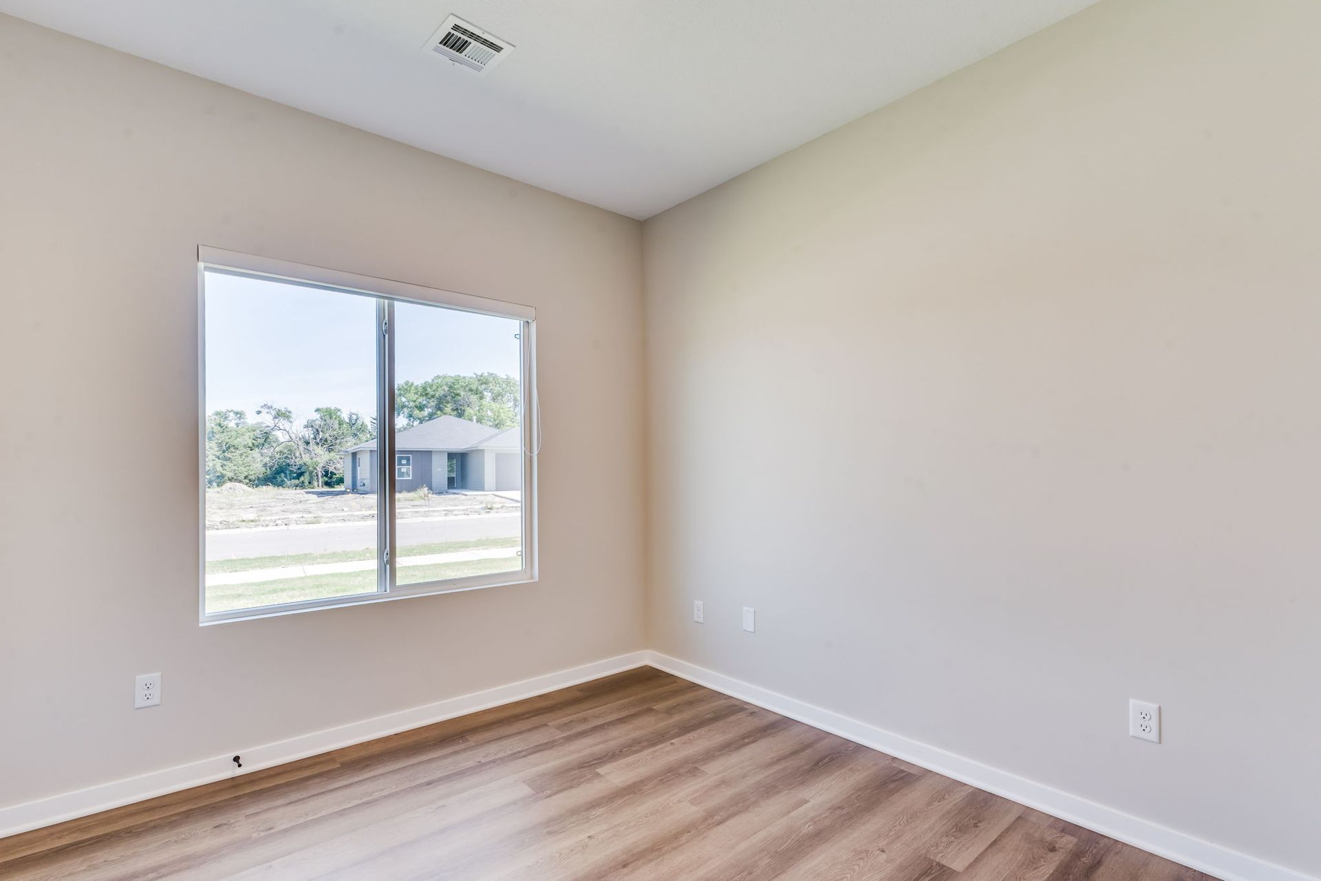 There is a large window in the middle of the room.