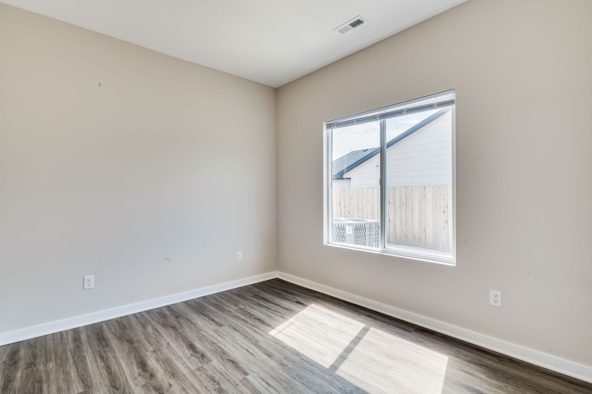 There is a large window in the middle of the room.