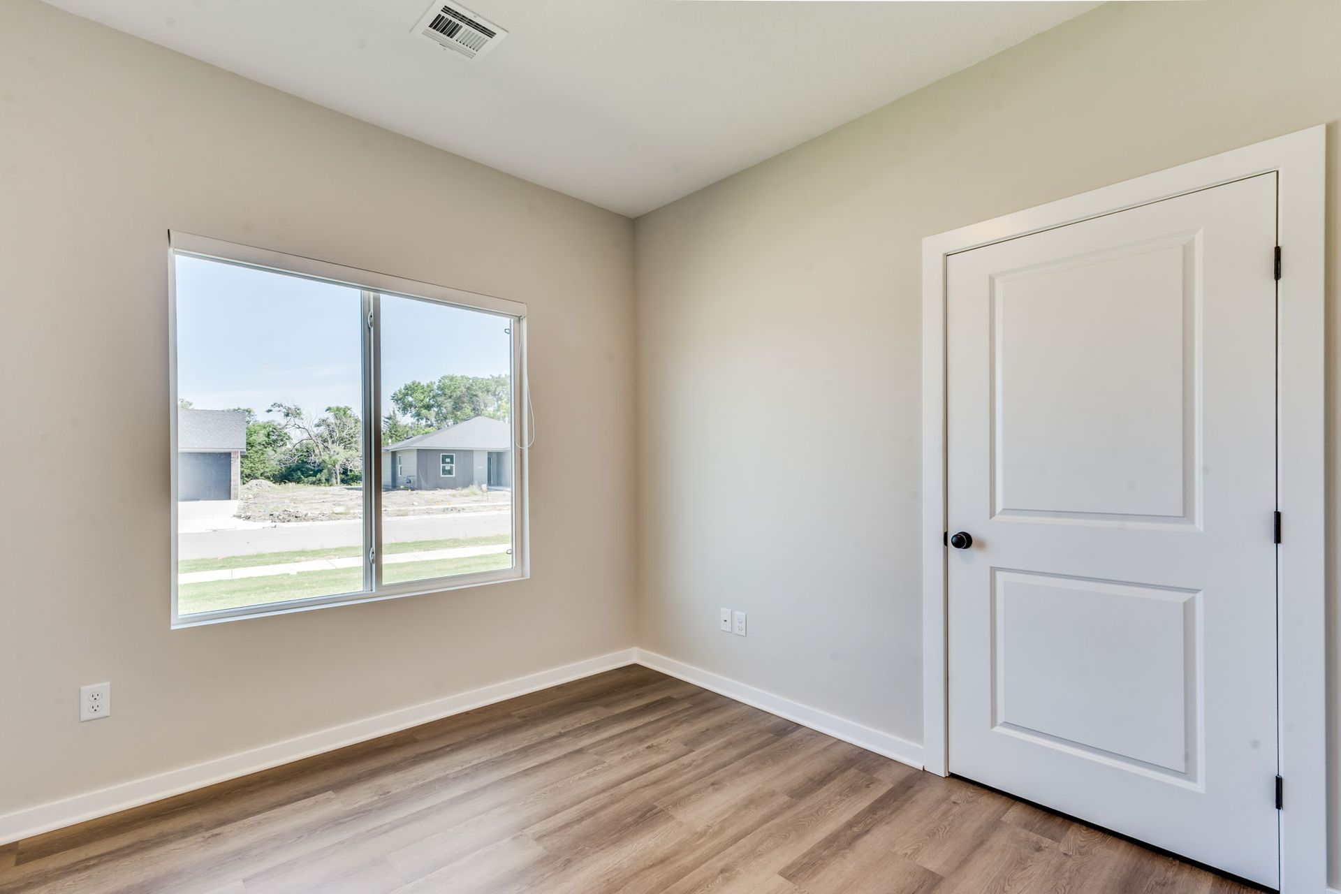There is a large window in the middle of the room.