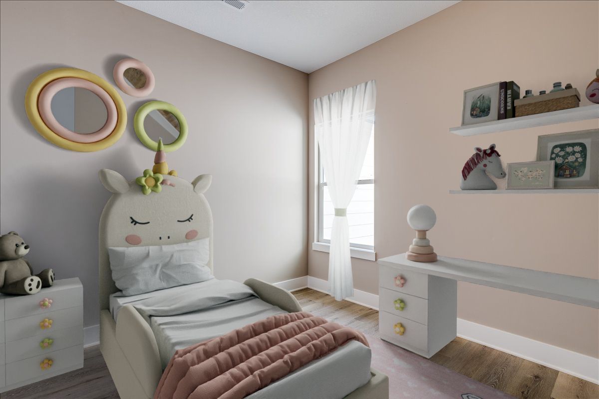 A bedroom with a bed and a desk with a unicorn headboard