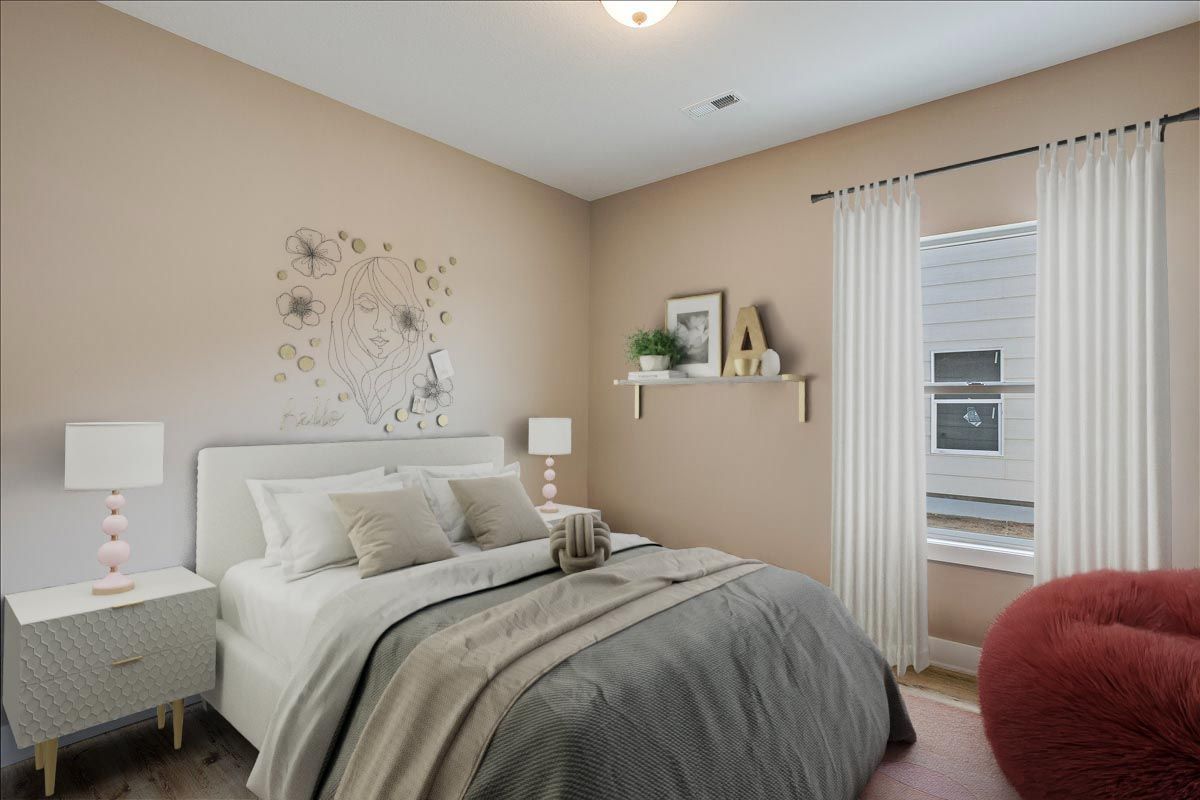 A bedroom with a bed , nightstand , lamps and a window.