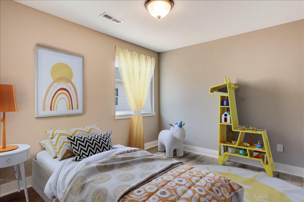 A bedroom with a bed , a bookshelf , a lamp , and a unicorn.