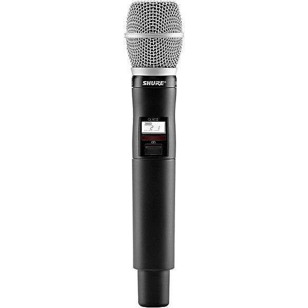 A wireless microphone with a remote control on a white background.