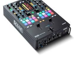 A black dj mixer with a lot of knobs and buttons on a white background.