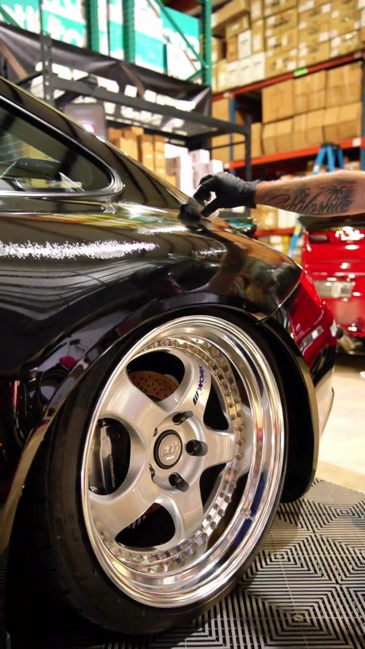 Applying a STEK Ceramic Coating on a black Porsche 911