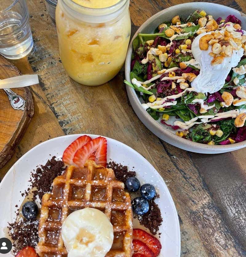 Breakfast with waffles and pineapple juice  — Coffee & Kitchen in Ballina, NSW