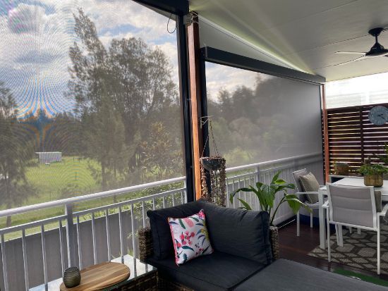 A close up of a beige fabric with a geometric pattern.