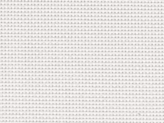 A close up of a white fabric with a grid pattern.