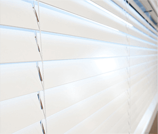 A close up of a beige fabric with a geometric pattern.