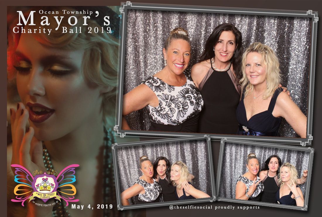 Photo booth strip at Mayor's Charity Ball 2014. Women in evening wear pose with a glitzy silver background.