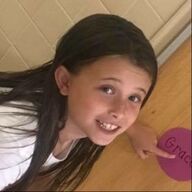 Girl pointing at a purple circle with the name 