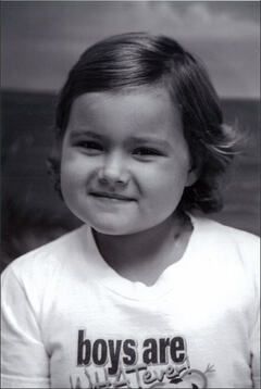 Girl in a white shirt with text