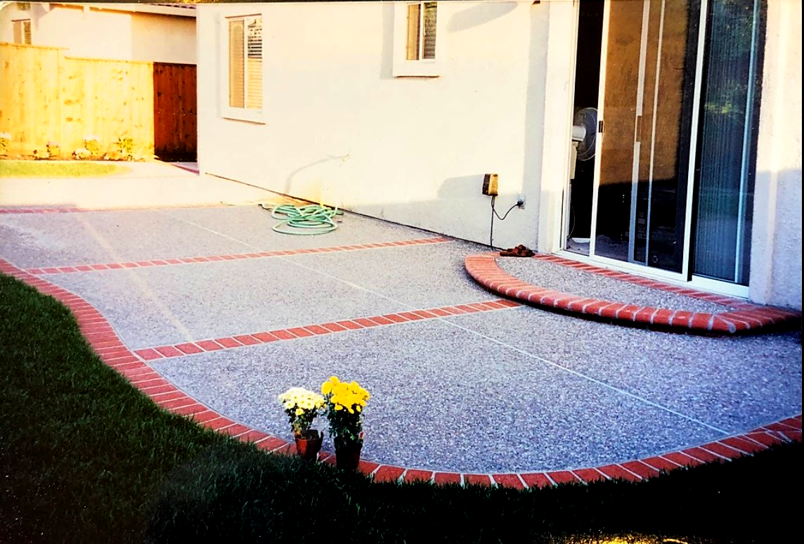Garden Brick Pathway Paving By Professional Paver Worker — Everett, WA — Northwest Concrete & Landscape Specialty, LLC