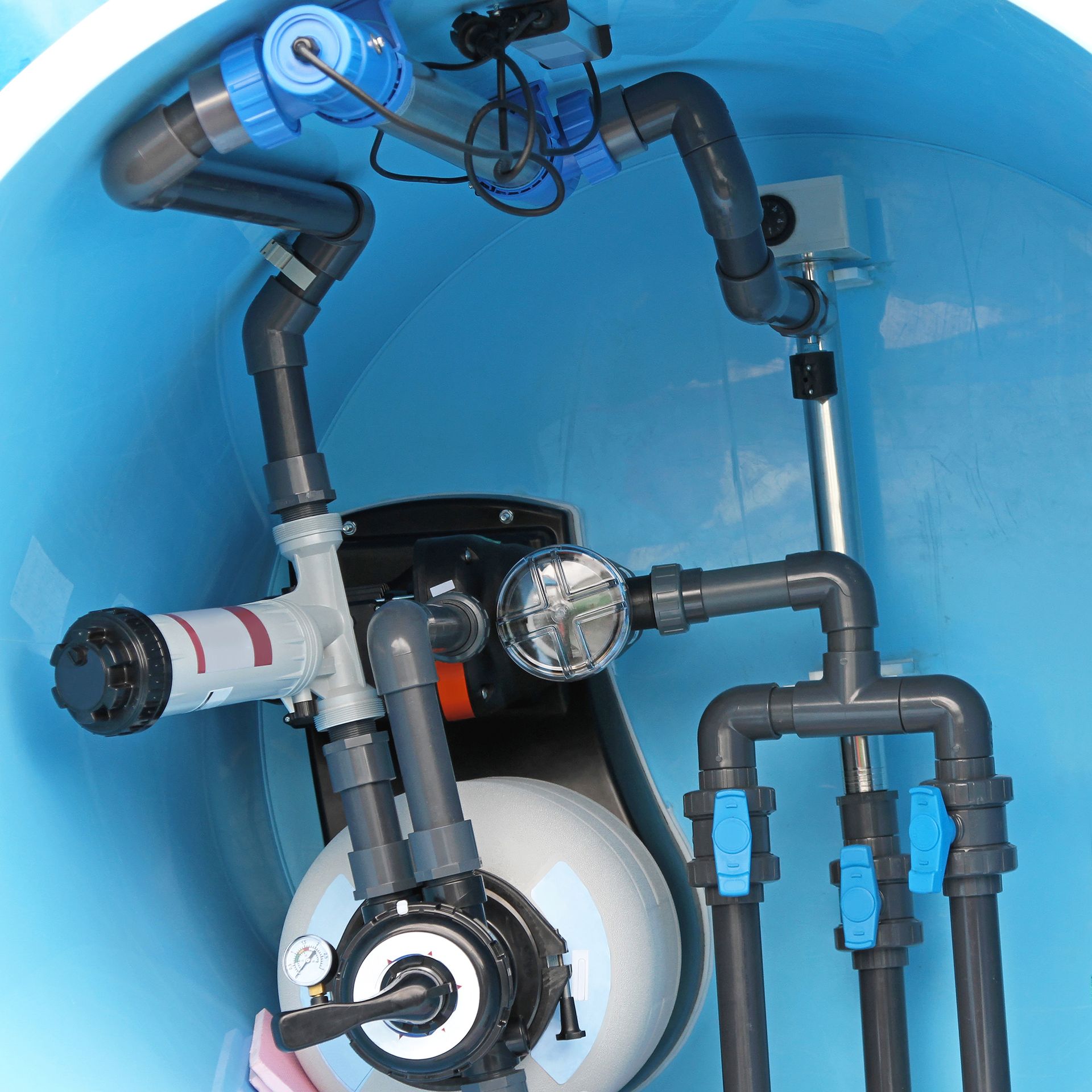 A blue water tank featuring pipes and valves, representing Water Well Pump Services Denver NC for ef