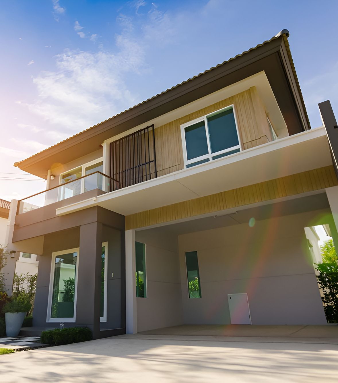 A Large House With A Large Garage And A Balcony — Anytime Conveyancing In Wingham, NSW