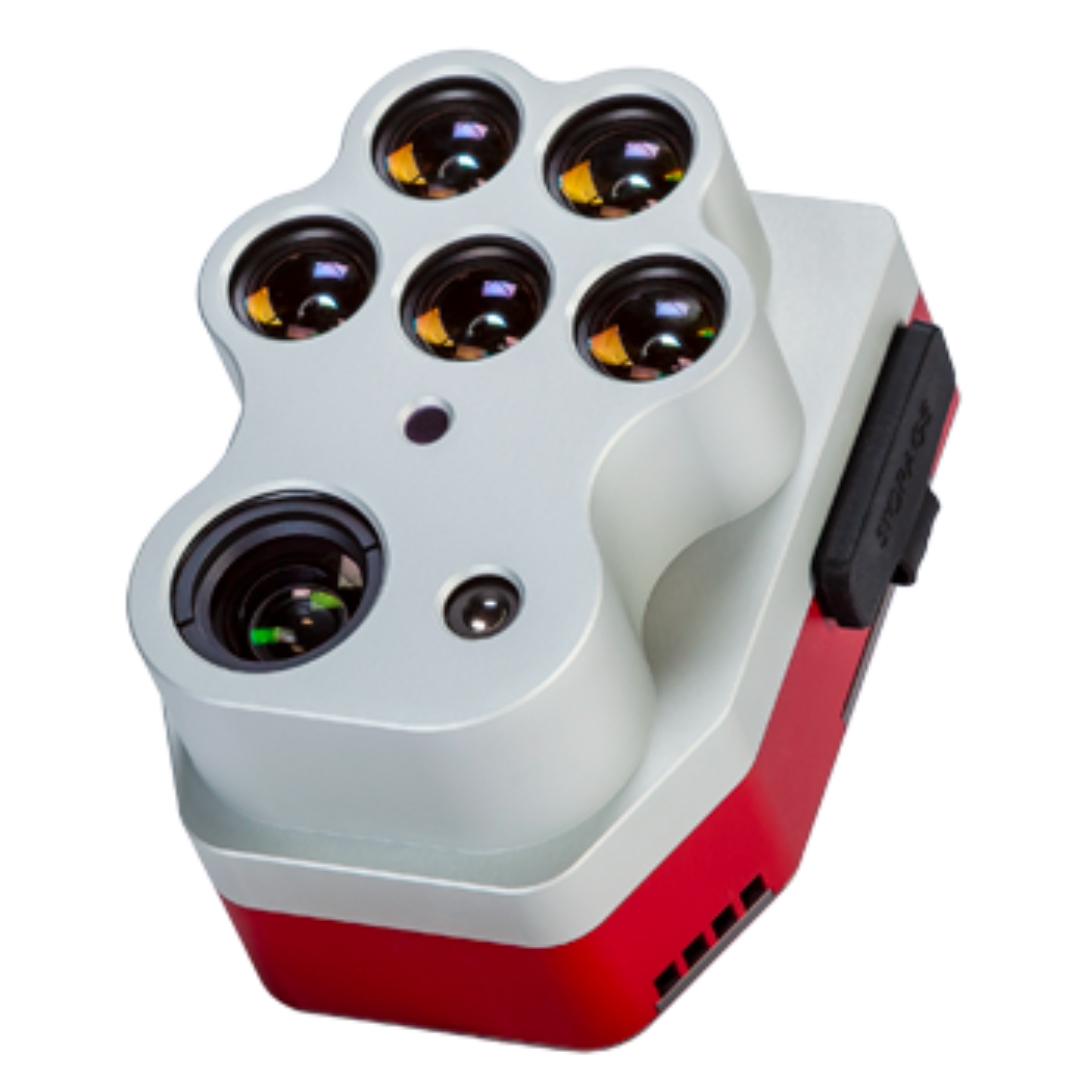 A red and white device with many lenses on it