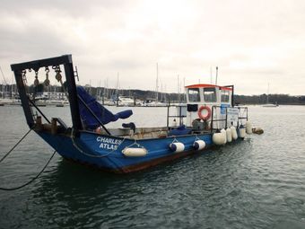 Charles Atlas on her mooring