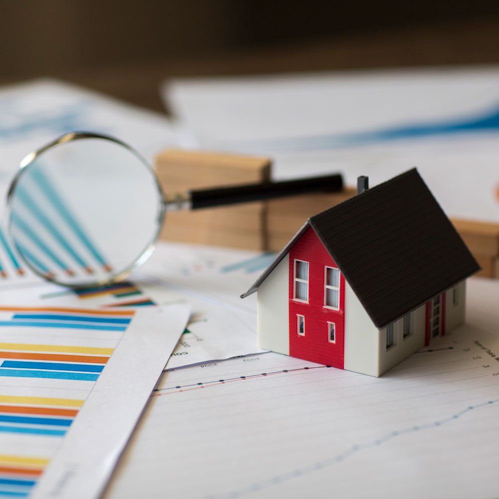 Miniature House and Magnifying Glass — Fort Myers, FL — Thomas Jussila