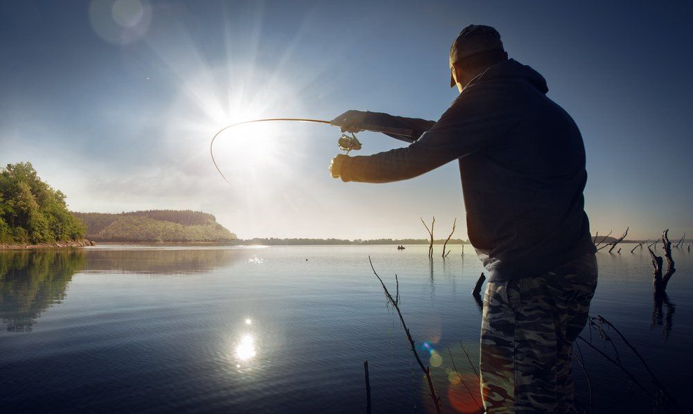 A Man Fishing — Butcher in Darwin