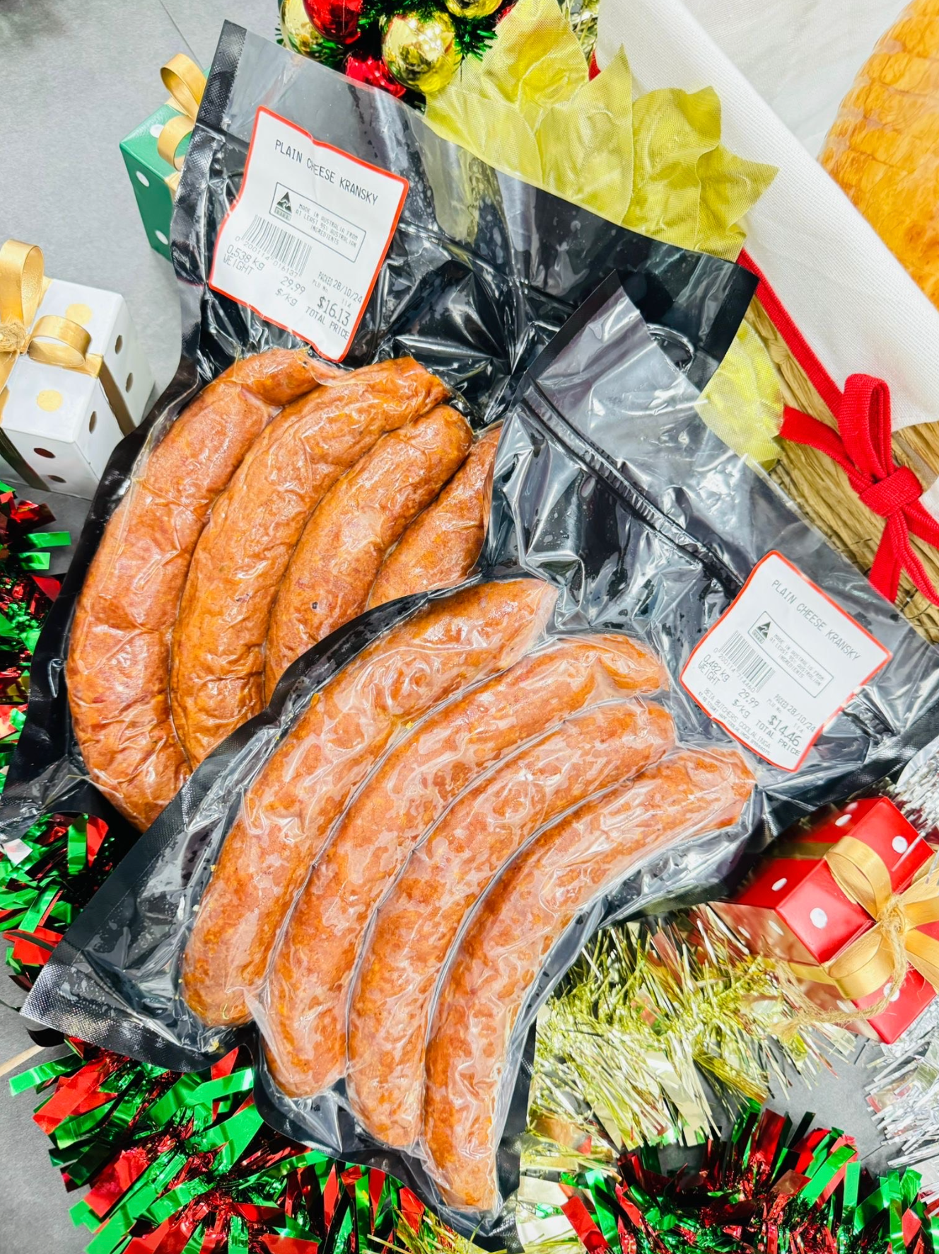 A bunch of sausages are sitting on top of each other on a table-Butcher in Darwin