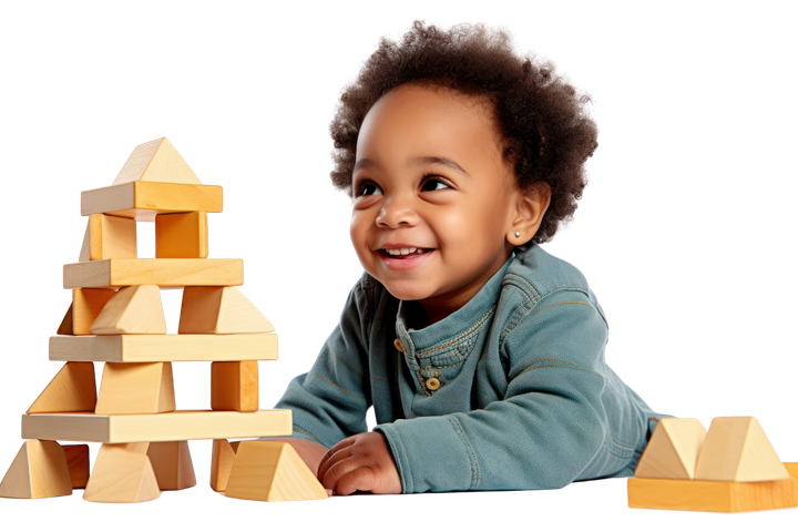 A little boy is laying on the floor playing with wooden blocks