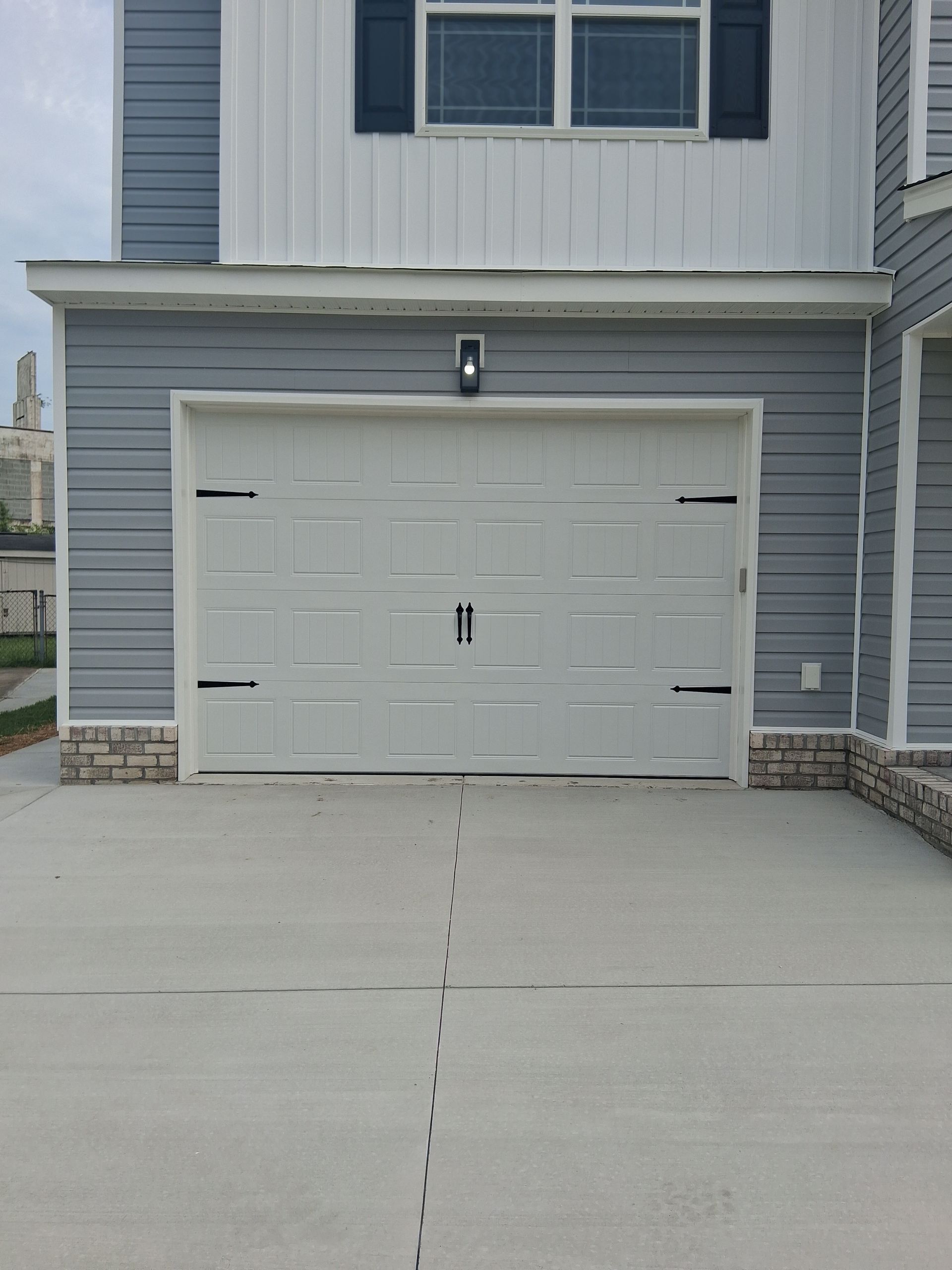 Looking up into a canyon with a white sky in the background