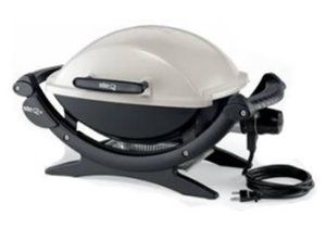 Electric grill with white cover, perfect for indoor grilling.