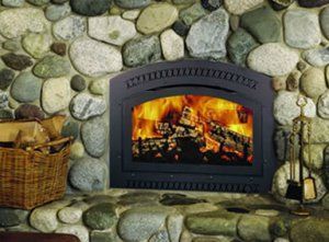 Stone wall fireplace with flickering flames, inviting and comforting