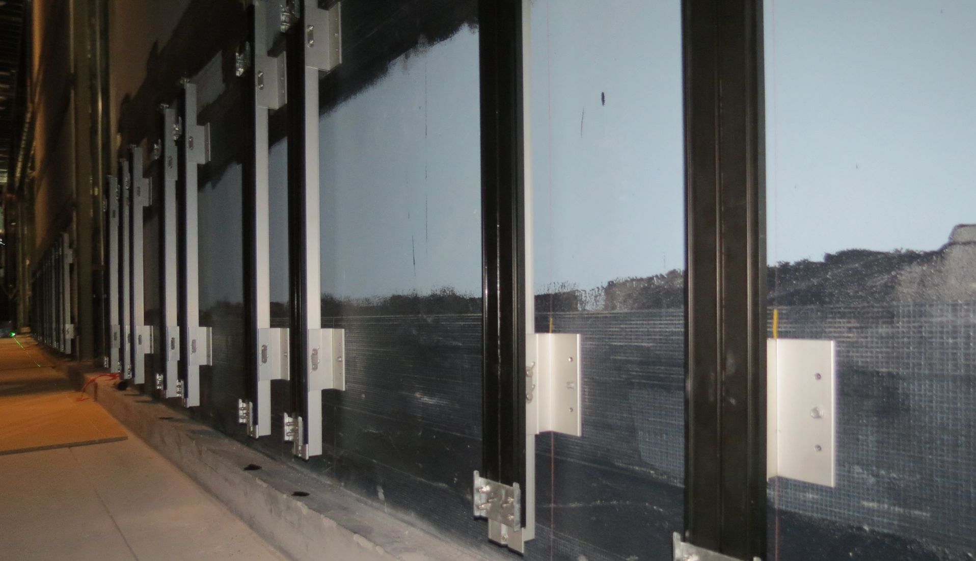 A large wall with a picture of a bridge on it