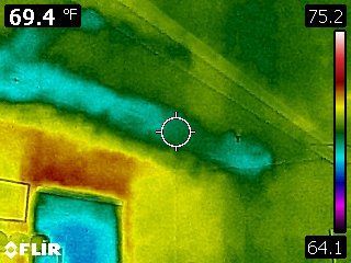 A large wall with a picture of a bridge on it