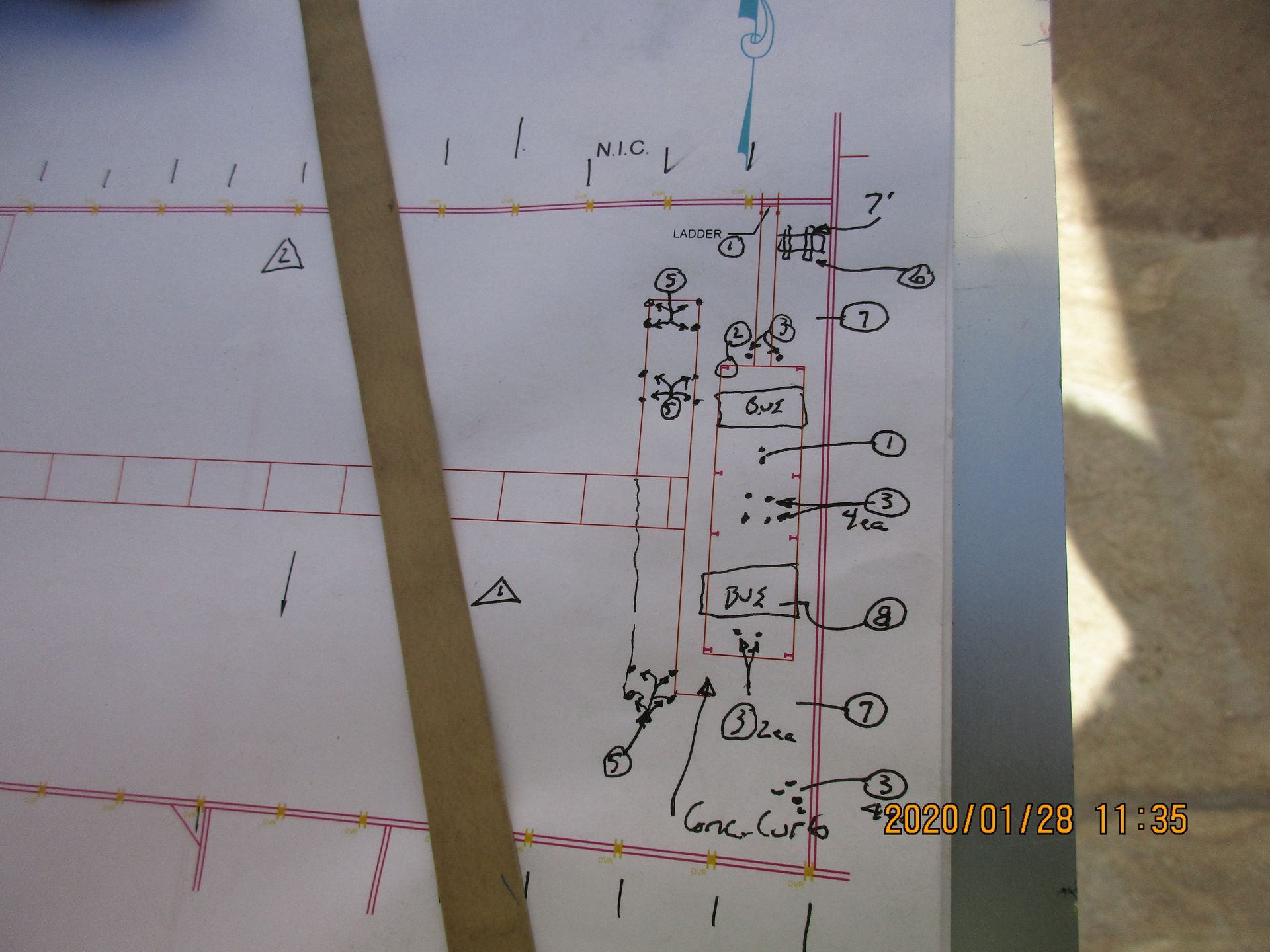 Hand-drawn diagram with electrical symbols, labeling equipment and circuits, likely a construction plan.