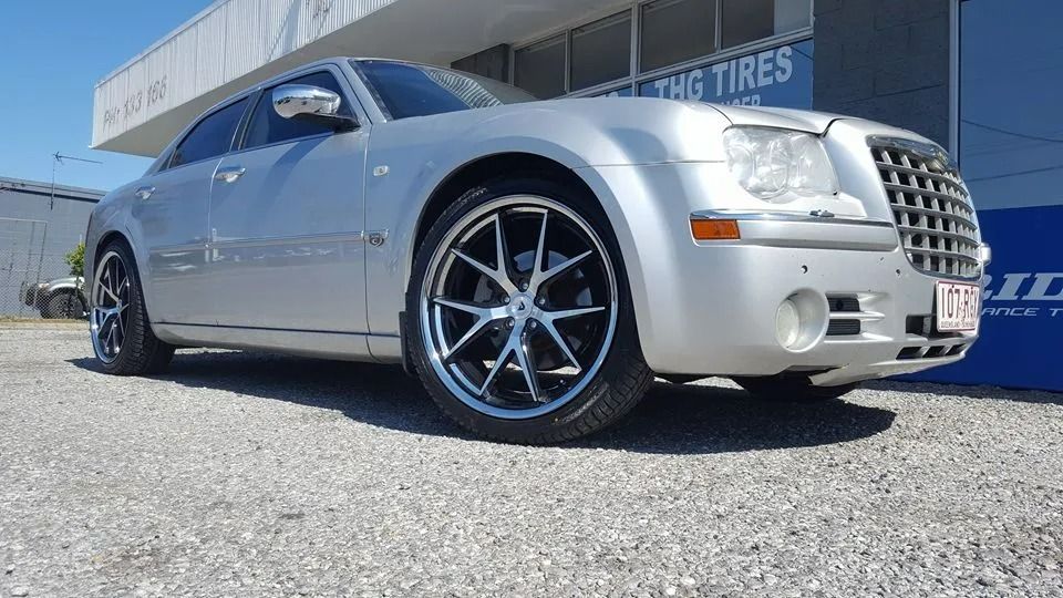 A Silver Chrysler 300 Sedan With Custom Spoked Wheels — THG Tires in Gladstone Central, QLD
