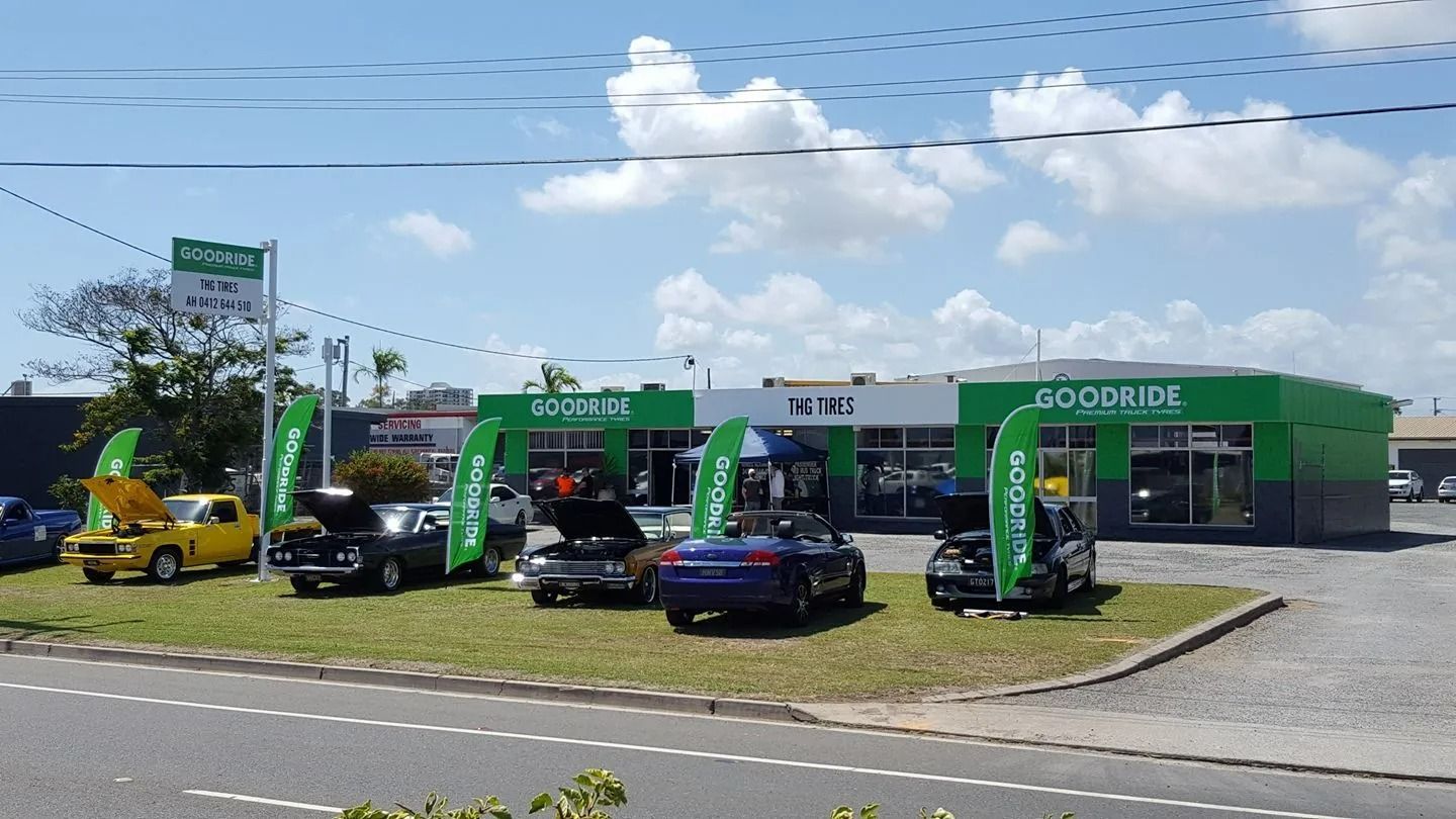 Several Classic Cars Are Displayed On The Grassy Lawn — THG Tires in Gladstone Central, QLD