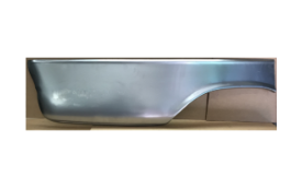 Silver metal car body panel with curved edge.